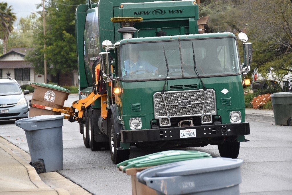 Trash truck on street